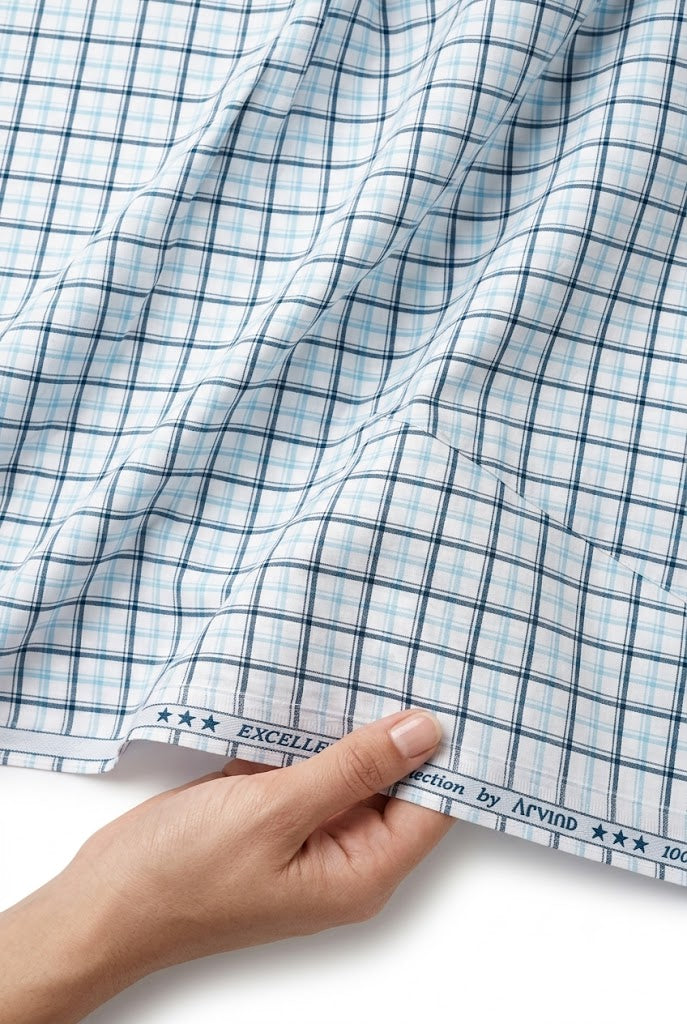 Light blue Arvind Checks Giza cotton shirting fabric, close-up of soft woven textile with check pattern and smooth texture.