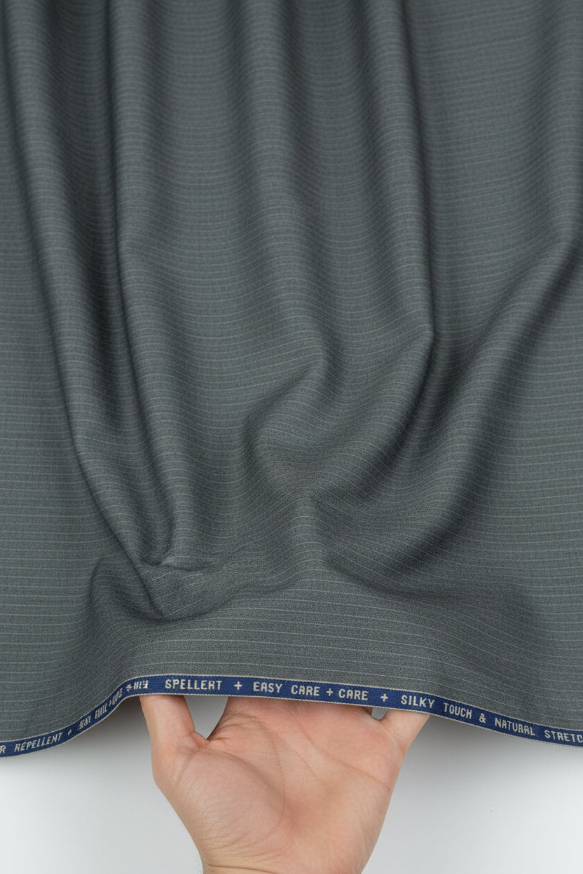 Grey Raymond Luxurious unstitched poly wool trouser and suiting fabric, ideal for making tailored suits and formal wear.