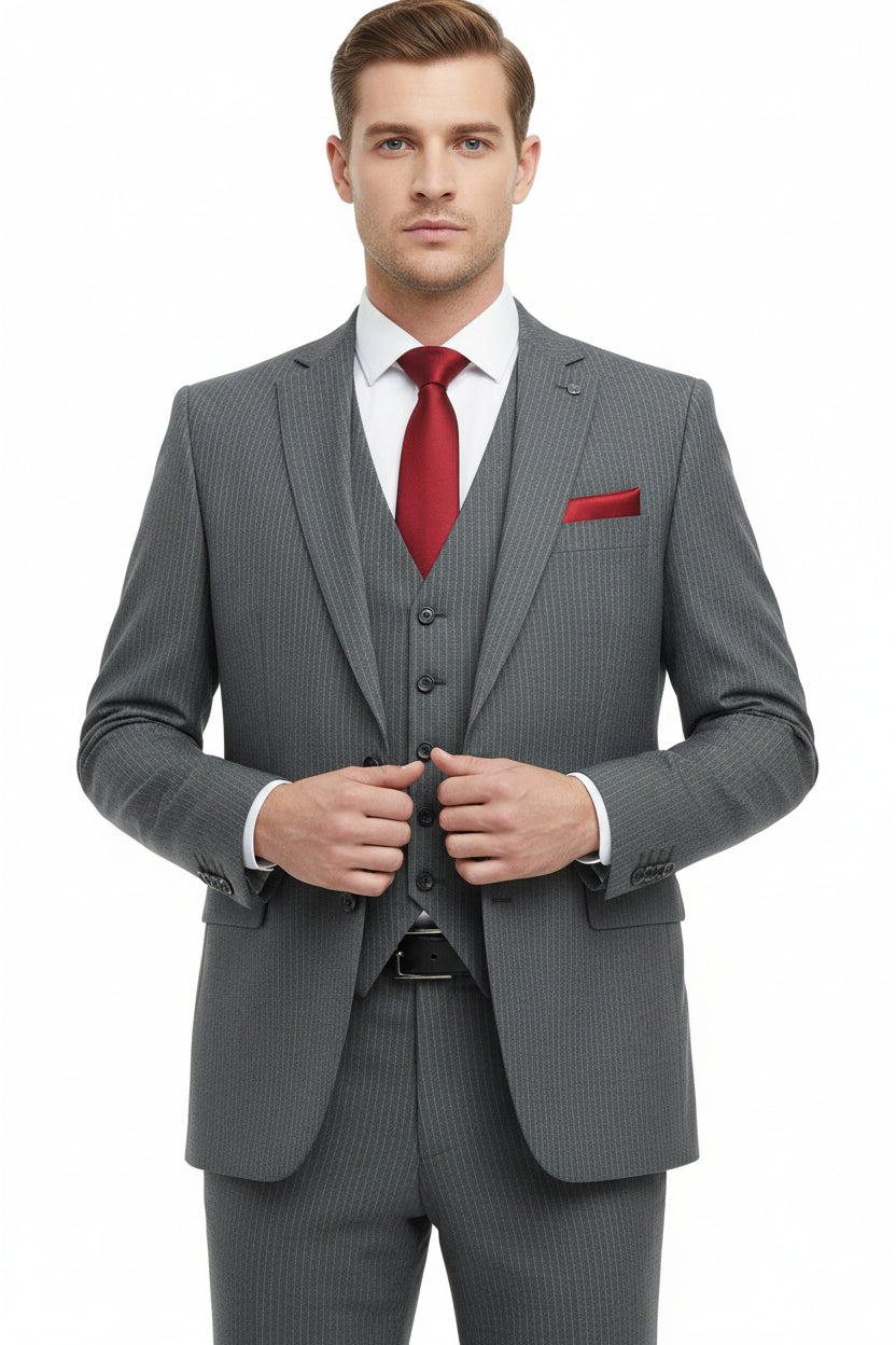 Grey Raymond unstitched poly wool trouser and suiting fabric, showing textured fabric with subtle weave details.