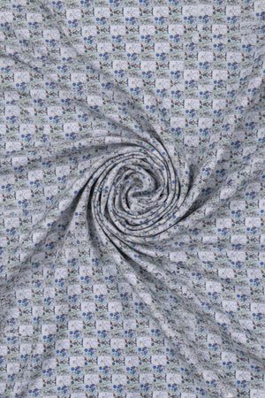 Lavender Pee Gee digital print cotton shirting fabric with floral pattern, ideal for shirts and lightweight clothing.