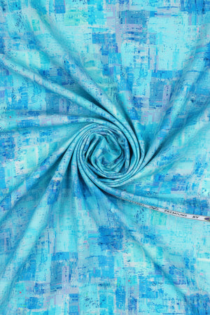 Blue digital print cotton shirting fabric by PEE GEE, showcasing a detailed unstitched textile pattern for shirts.