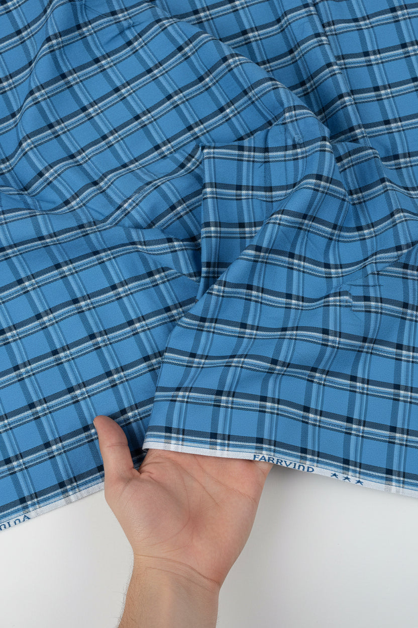 Blue Arvind Checks unstitched PC shirting fabric showcasing a checked pattern, ideal for custom shirts.