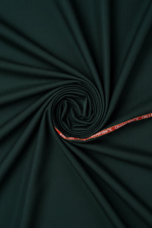 Green Spinach Raymond Luxurious Unstitched Polywool Trousers and Suiting Fabric showing fabric texture and color in natural light.