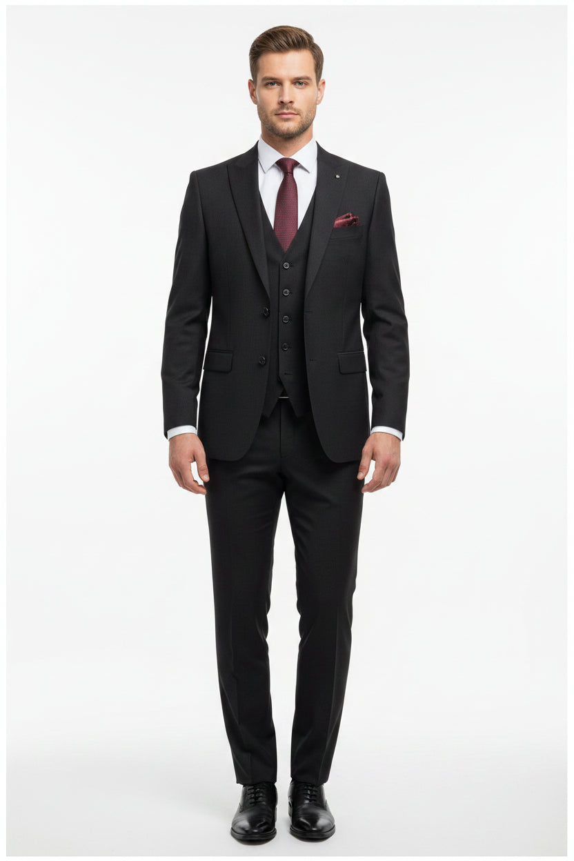 Raymond luxurious unstitched poly wool trousers and suiting fabric in charcoal grey, suitable for tailoring and formal wear.