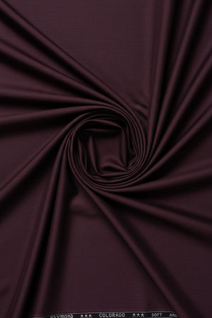 Dark purple fabric with 'Raymond Colorado' label at the top.