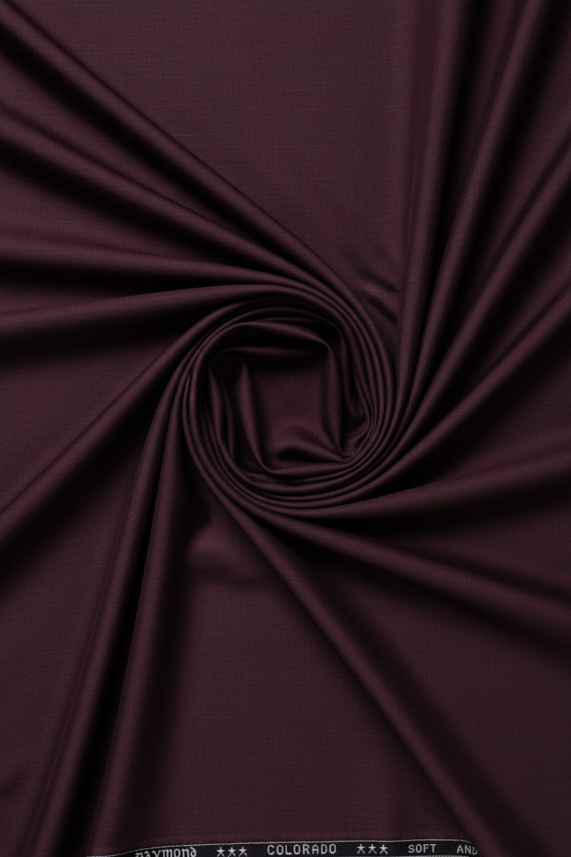 Dark purple fabric with 'Raymond Colorado' label at the top.