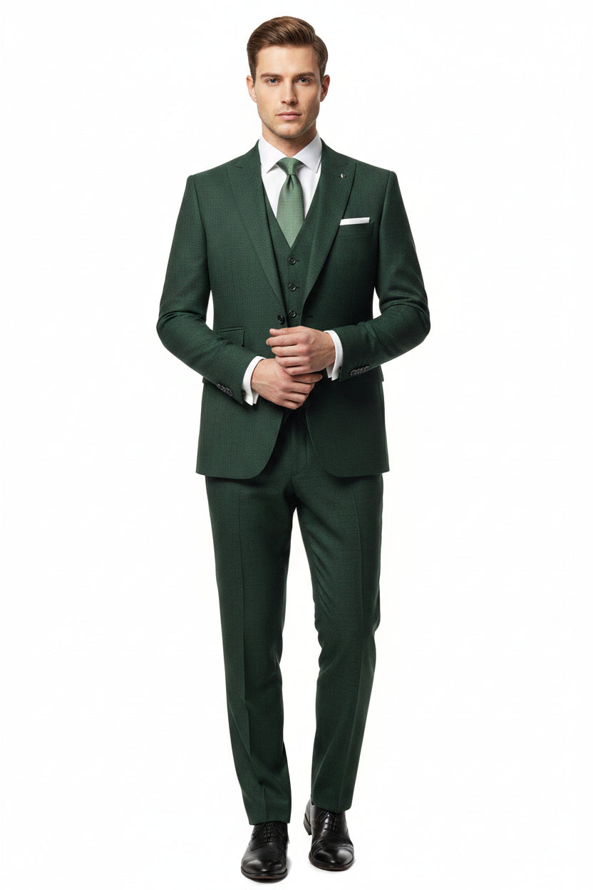 Green Raymond Polyviscose trousers and suiting fabric shown in a close-up image, highlighting the textured fabric and color details.