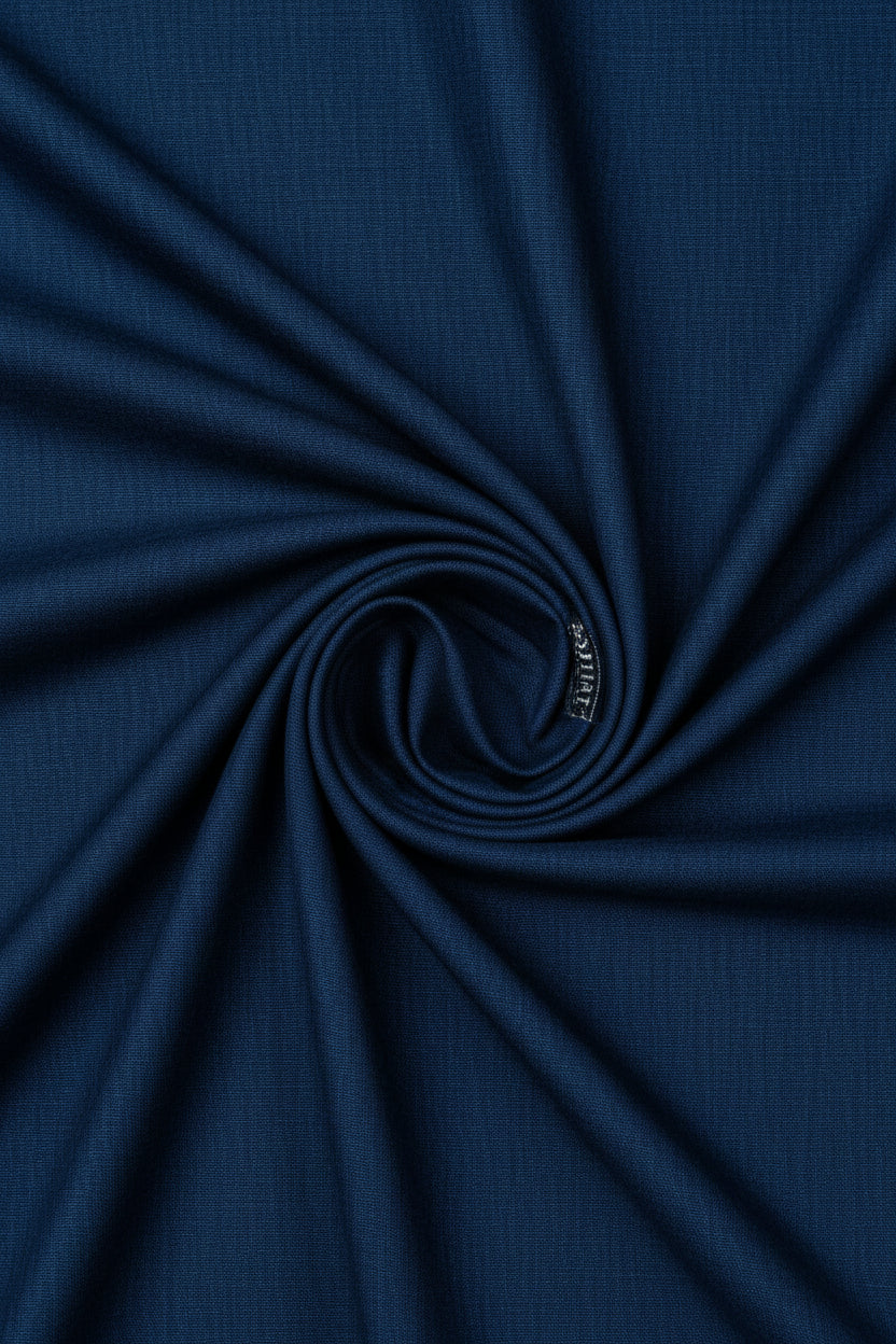 Blue Raymond Polyviscose trousers and suiting fabric, showcasing a smooth, tailored textile suitable for formal wear.