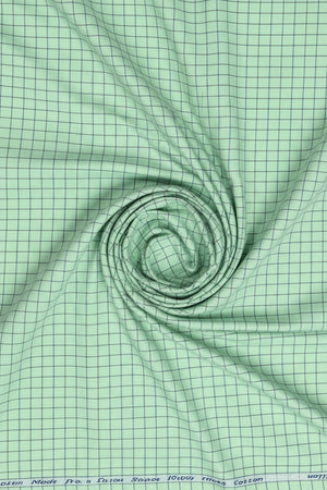 Jade green Arvind cotton shirting fabric with unstitched checks, suitable for making shirts and tailored clothing.