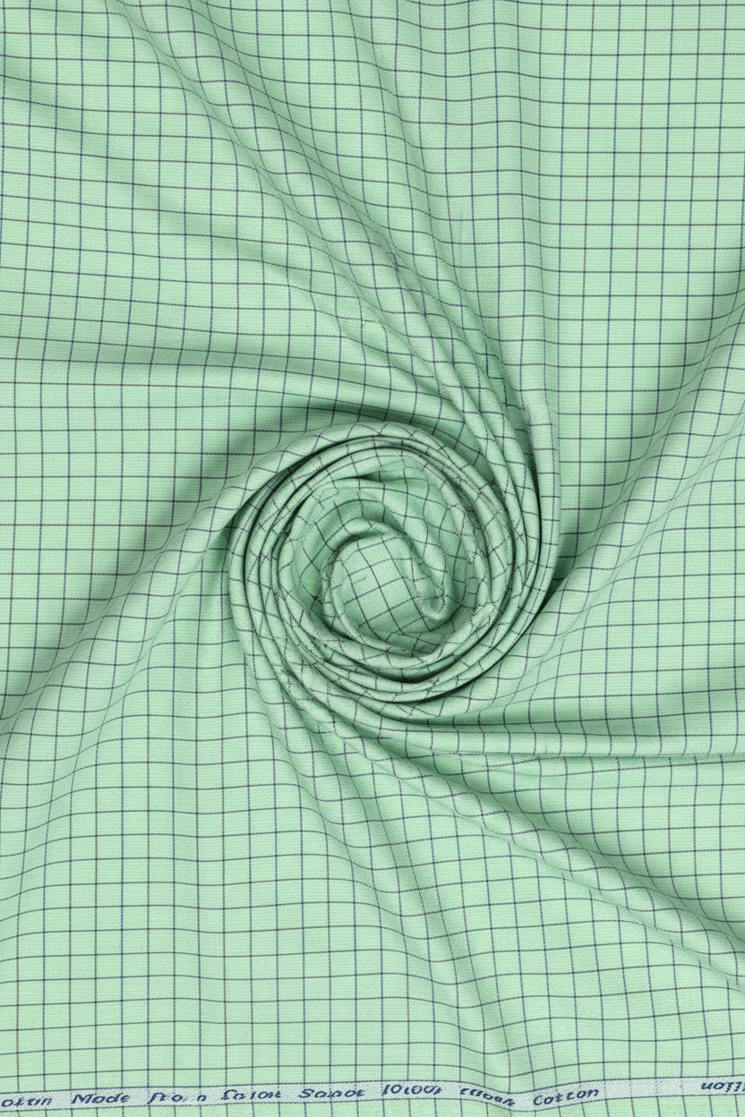 Jade green Arvind cotton shirting fabric with unstitched checks, suitable for making shirts and tailored clothing.