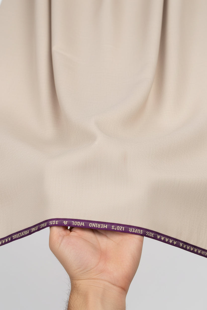 Raymond Ivory polywool trousers and suiting fabric, unstitched, luxurious material with a smooth texture and elegant appearance.