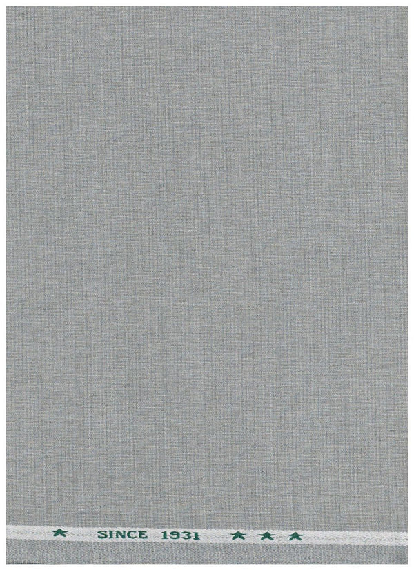 A close-up of a light gray woven fabric texture with a narrow white header band at the top featuring small green decorative marks and the text 'SINCE 1931'.
