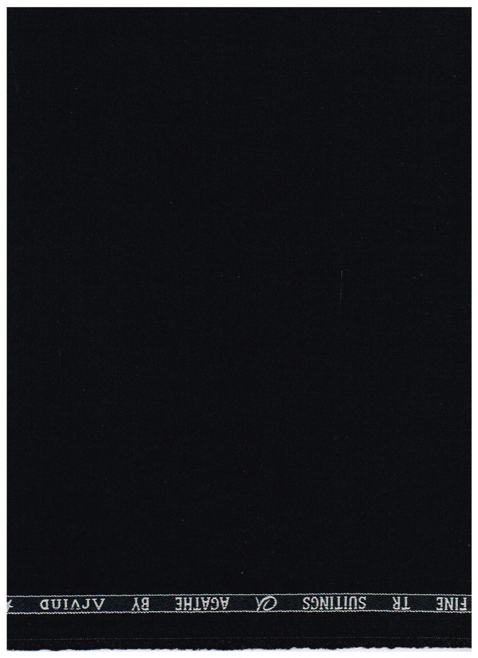 A close-up of black fabric with a narrow white printed header at the top reading 'FINE TR SUITINGS AGATHE BY AVIDIO'.