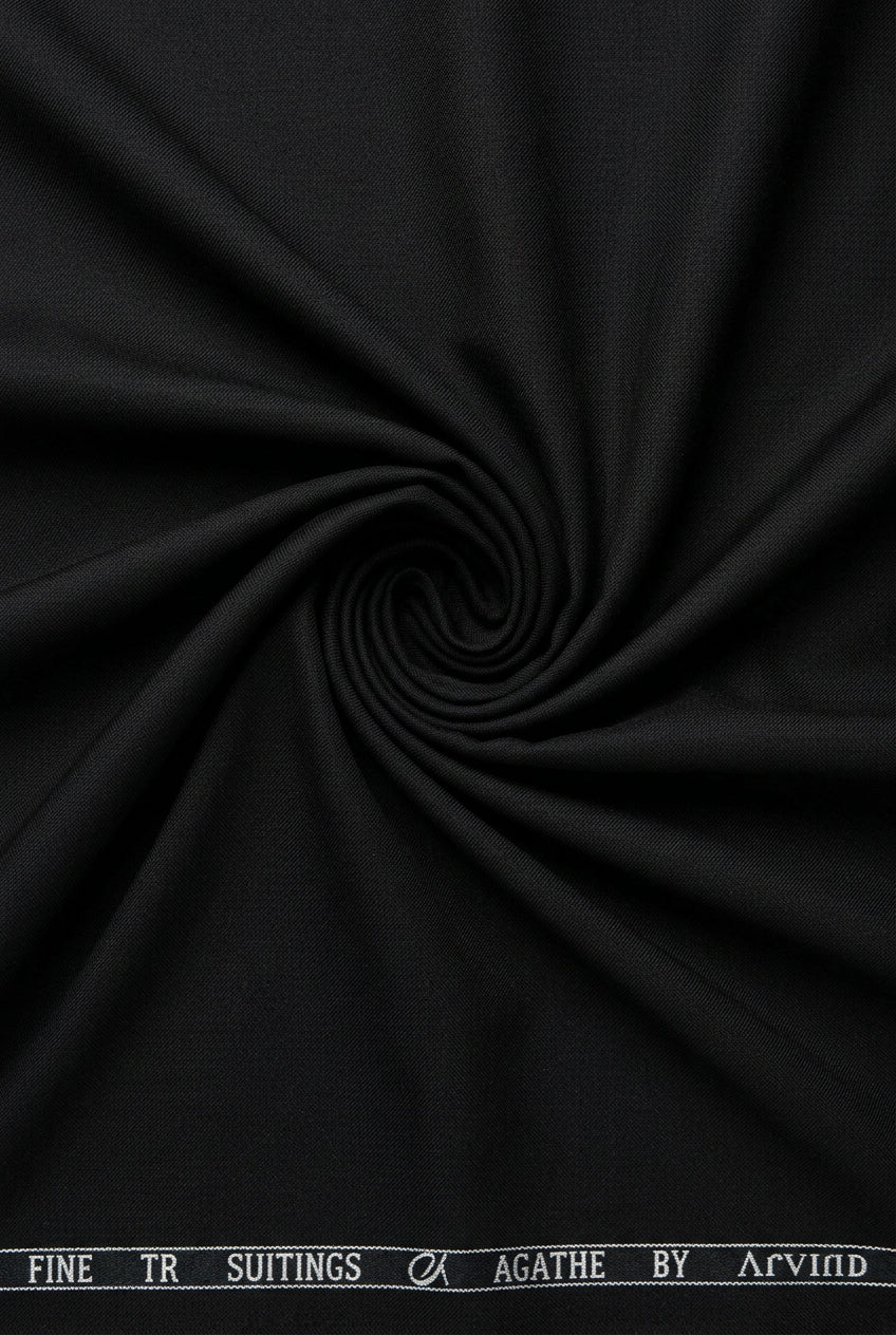 Black Arvind Terry Rayon Suiting Fabric with smooth texture, shown in a close-up image highlighting its fabric surface and weave.
