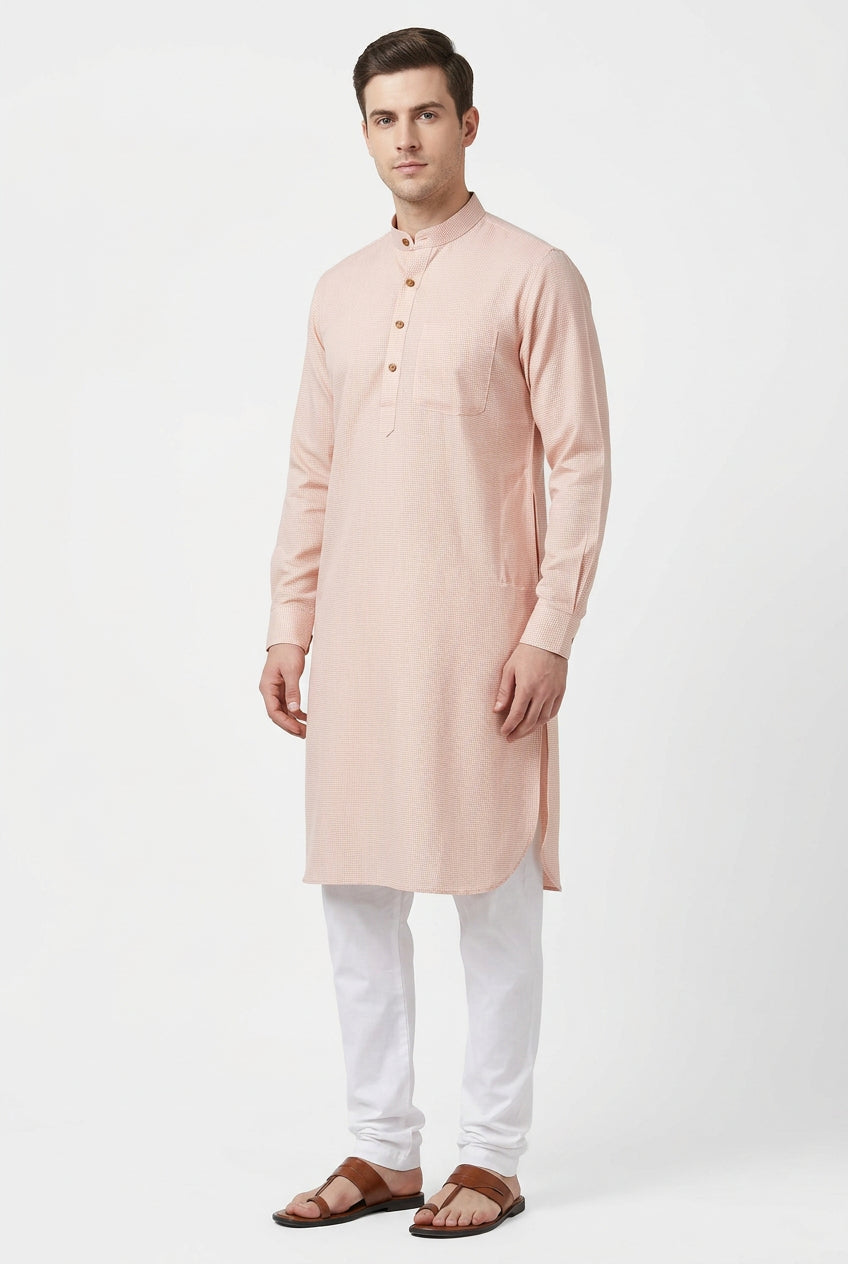 Peach Arvind Polycot shirt fabric with cotton blend, featuring a smooth texture and vibrant color for stylish clothing.