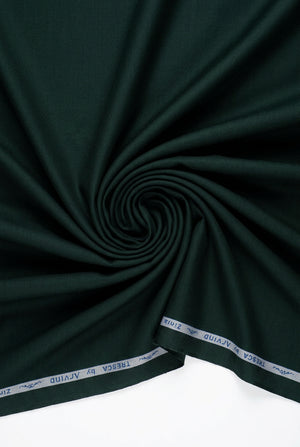 Green Arvind cotton satin shirt fabric with a smooth, shiny finish, showcasing the luxurious cotton satin material.