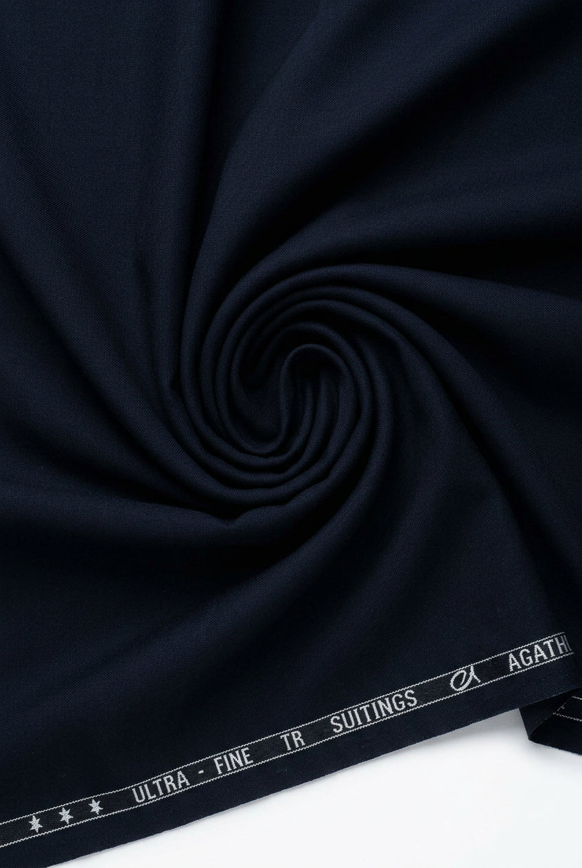 Navy blue Arvind Terry Rayon Suiting Fabric with a smooth texture, suitable for making elegant traditional or formal garments.