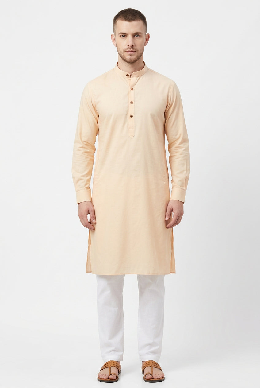 Peach cotton satin shirting fabric by ARVIND with a smooth, shiny finish and lightweight texture, ideal for elegant shirts.