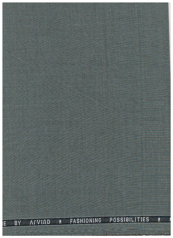 A close-up of a textured fabric swatch in a muted slate gray-green color, with a black waistband band at the top featuring white text that reads 'BY AVOID FASHIONING POSSIBILITIES'.