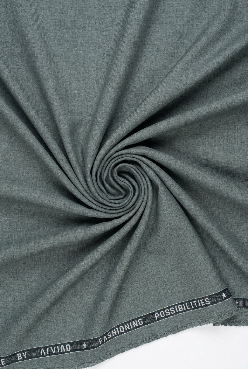 Grey Arvind Terry Rayon unstitched suit fabric, showing smooth texture and fabric details for sewing and fashion design.