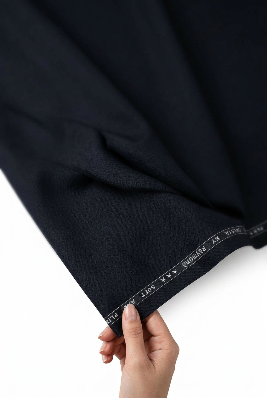 Blackish blue Raymond Terry rayon suiting fabric swatch with textured pattern and subtle sheen, ideal for tailored suits.