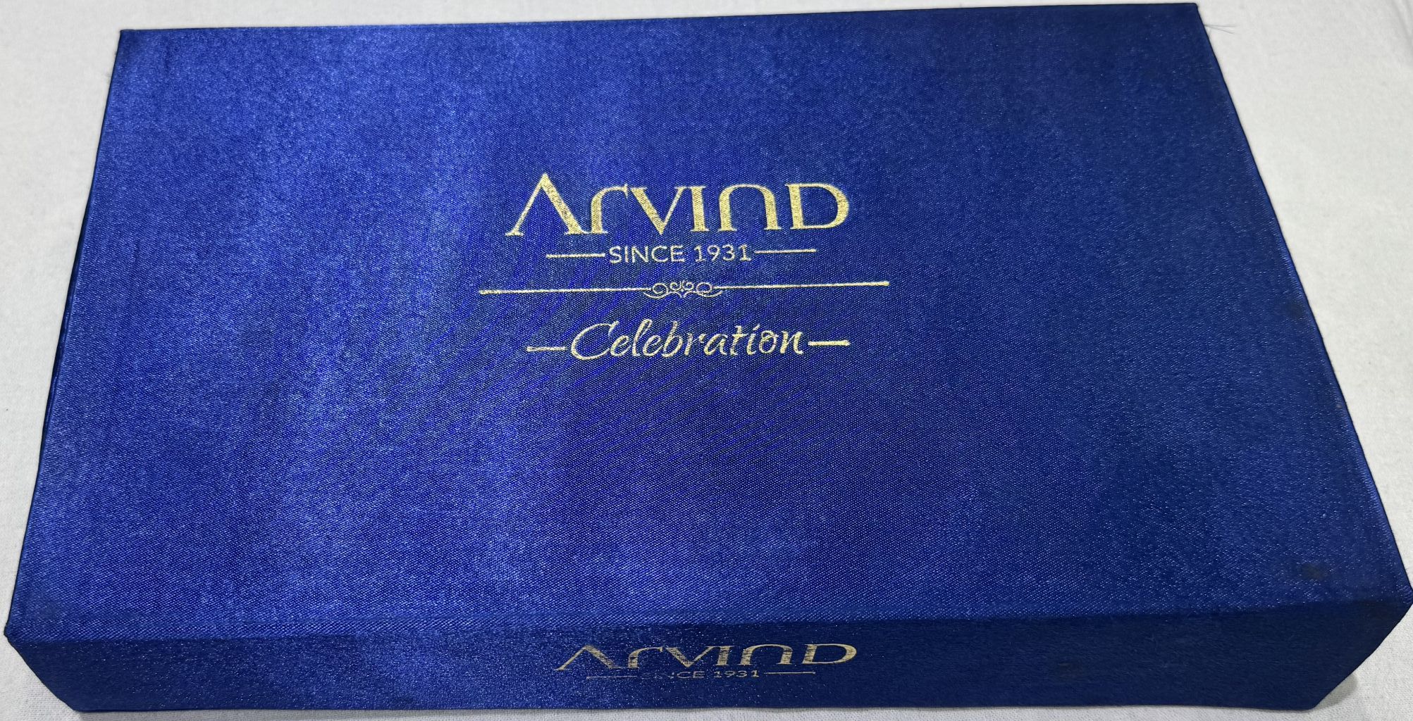Arvind Combo Gift Pack of Unstitched Shirt & Trouser Fabrics