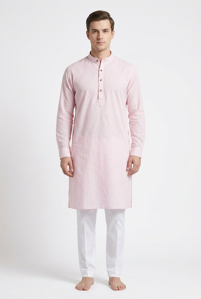 A light pink cotton fabric sheet with visible wrinkles, showing a blue printed edge with 'COTTON' text at the bottom.