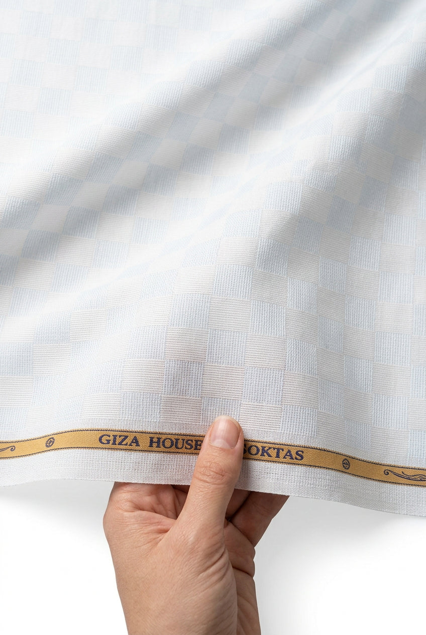 Blue Dobby Checks on light blue background Soktas shirting fabric sold by mensfabric.com