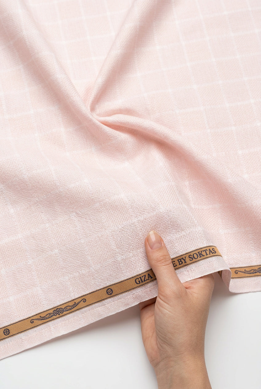 Peach coloured small dobby self checks on white background Soktas shirting fabric
