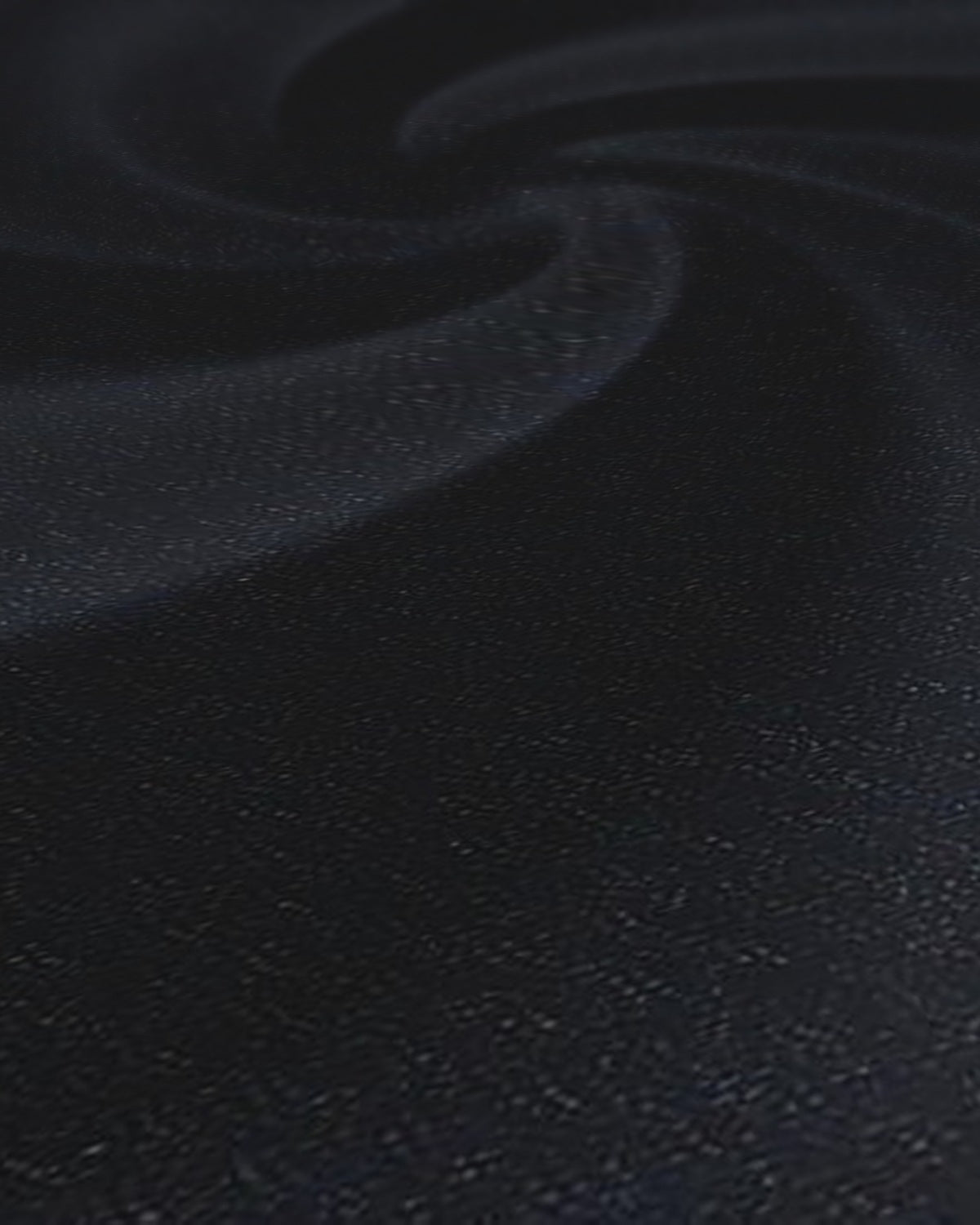 Raymond Terry Rayon Suiting Fabric Blackish Blue - weave close-up with draped swirl