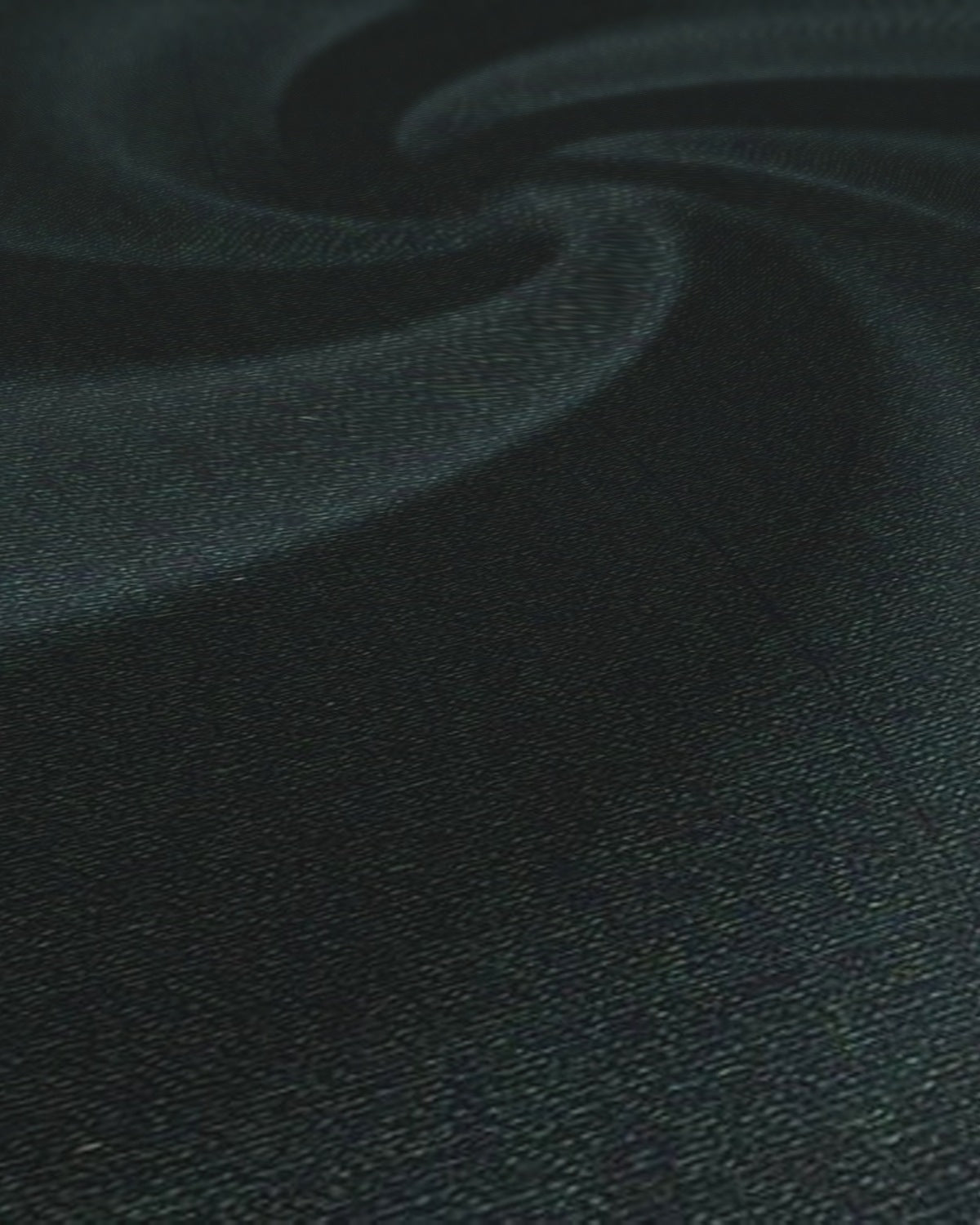 Arvind Cotton Satin Shirt Fabric Green - weave close-up with draped swirl
