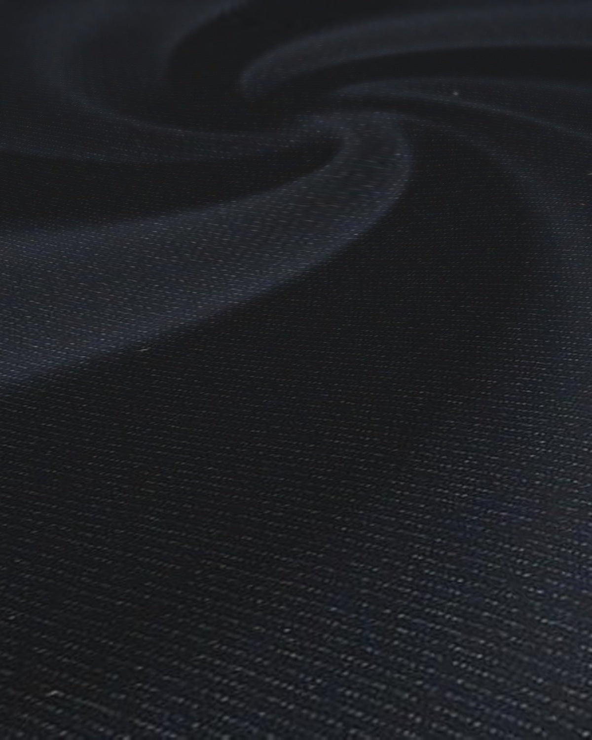 Arvind Terry Rayon Suiting Fabric Navy Blue - weave close-up with draped swirl