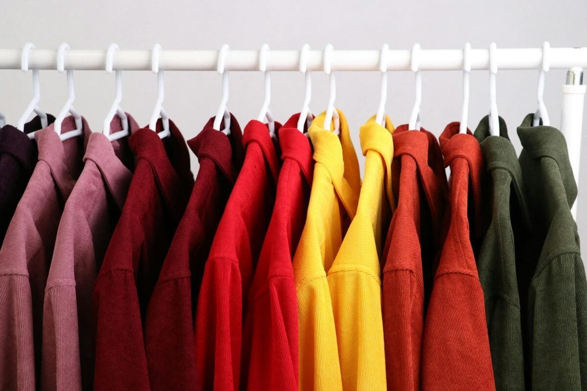 colorful clothes hanging on a clothing rack